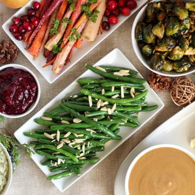 An table of assorted holiday side dishes and recipes.