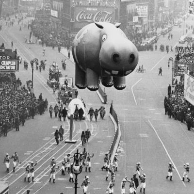 A hippo balloon floats over Times Square during the annual Macy's Thanksgiving Day Parade in New York City in 1940.