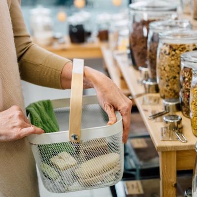 A woman shops at a zero-waste store.