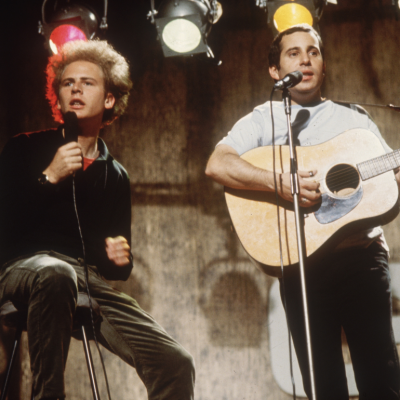 Pop duo Simon and Garfunkel, comprising (L-R) singer, Art Garfunkel and singer-songwriter, Paul Simon, performing on ITV's 'Ready, Steady, Go!', July 8, 1966.