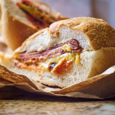 A pork roll, egg, and cheese breakfast sandwich on a kaiser roll with salt, pepper, and ketchup from New Jersey.