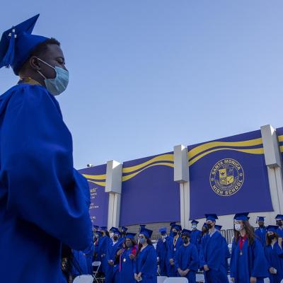 Santa Monica High School students file into the Memorial Greek Theatre for their graduation ceremony for the class of 2021.