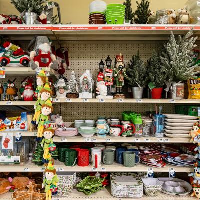 Christmas items such as decorations, toys and chocolates for sale at a local market.