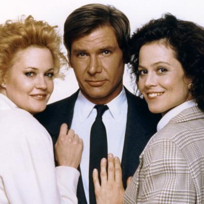 Actors Melanie Griffith, Harrison Ford, and Sigourney Weaver on the set of 'Working Girl.'