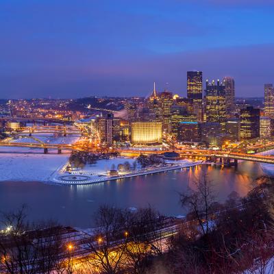 A view of downtown Pittsburgh during twilight.