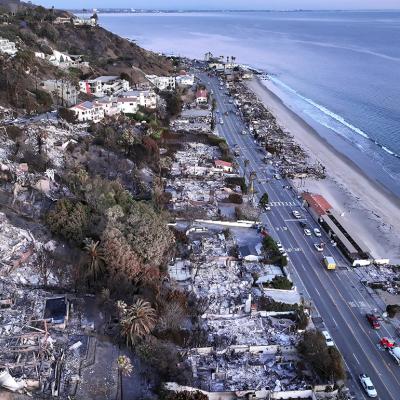 An aerial view of the aftermath of the Palisades wildfires on LA homes along the beach on January 15, 2025 in Malibu, California.