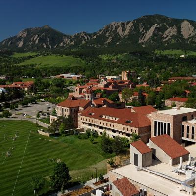 An aerial view of the landscape and campus of University of Colorado in Boulder, CO.