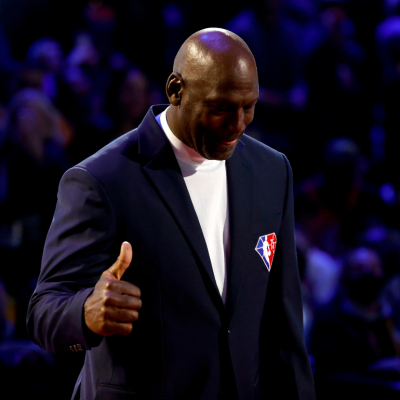 Michael Jordan reacts after being introduced as part of the NBA 75th Anniversary Team during the 2022 NBA All-Star Game, February 2022.