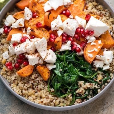 A plate of quinoa, feta cheese and sweet potatoes salad.