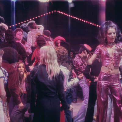 Clubbers on the dancefloor in a nightclub, circa 1975. 