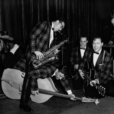 Rock 'n' roll group Bill Haley And His Comets, seen here during rehearsals in London for their first British performance, circa 1957.