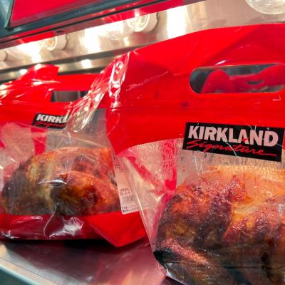 Costco rotisserie chicken in a new plastic bag packaging.