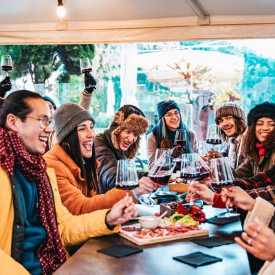 Friends eating in a restaurant in winter