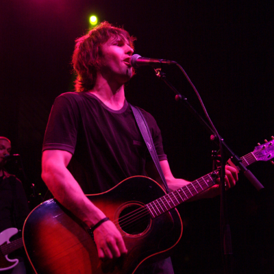 Singer James Blunt performing at a concert, circa 2005