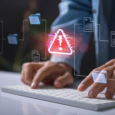 A company's network of information illustrated with malware and risk alert icon.