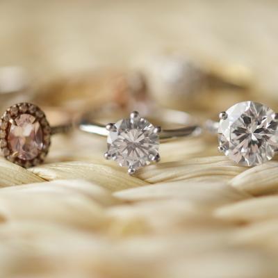 An assortment of different types of diamond engagement rings.