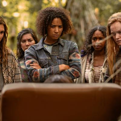 Sophie Nélisse as Shauna, Vanessa Prasad as Gen, Jasmin Savoy Brown as Taissa, Silvana Estifanos as Britt, and Liv Hewson as Van in Season 3 of "Yellowjackets."