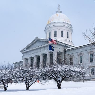 The Vermont Statehouse during a snowy day.