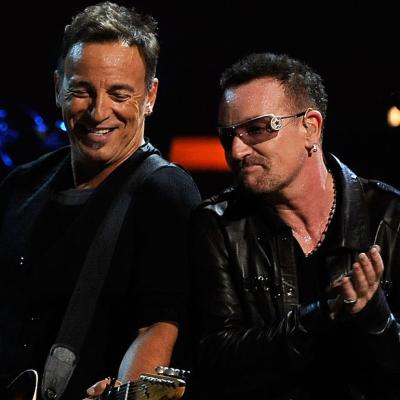 Bruce Springsteen and Bono perform at Madison Square Garden on Dec. 12, 2012 in New York City.