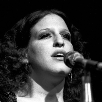 Close-up of American singer and actress Bette Midler as she performs onstage during her 'Continental Baths' tour, New York, New York, 1972. 