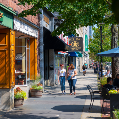 Historic commercial buildings on Massachusetts Avenue at Inman Street in the city center of Cambridge, Massachusetts MA, USA.