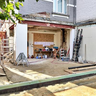 A new wall and ground in construction for a modern extension of a house.