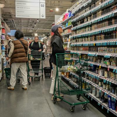 Consumers looking at the tea, coffee and spices aisle in a supermarket in New York.