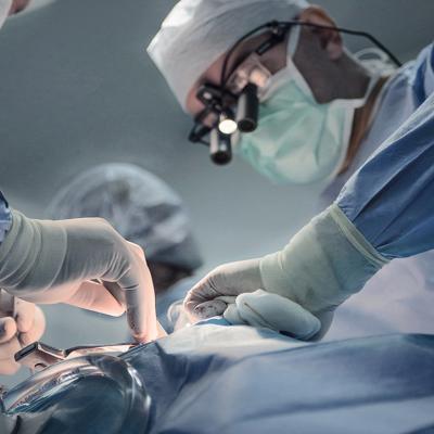 Doctors perform surgery of a cardiac stent transplant in a hospital.