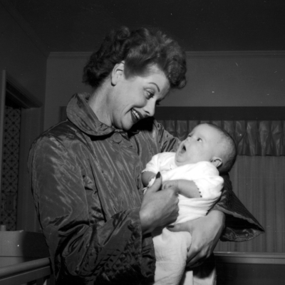 Lucille Ball at home with her son Desi Arnaz Jr., 1953.