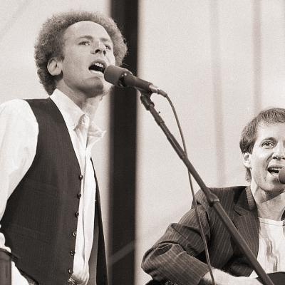 Art Garfunkel and Paul Simon perform for more than 500,000 fans in Central Park.