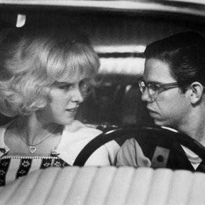 Actors Candy Clark and Charles Martin Smith in a scene from the classic film 'American Graffiti.'