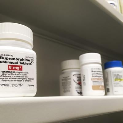 A Buprenorphine bottle on a shelf.
