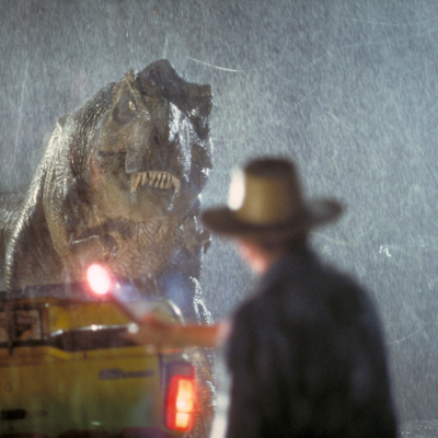 Actor Sam Neill as Dr. Alan Grant takes on a Tyrannosaurus Rex in a scene from the film 'Jurassic Park', 1993.
