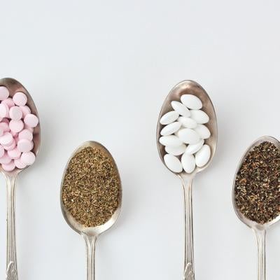 Spoonfuls of supplements such as chamomile, magnesium pills, vitamin B complex pills and lemon balm.