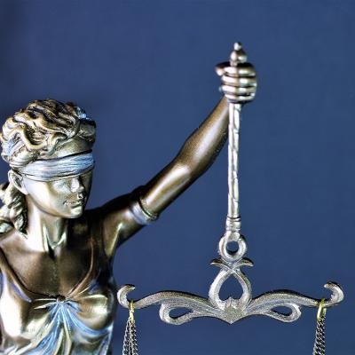 A figure of Justitia or Lady Justice.