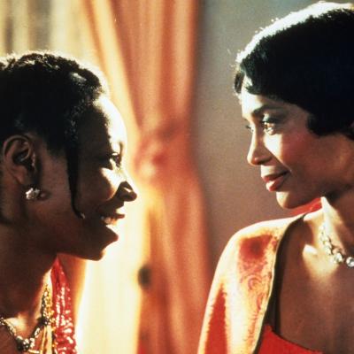 Whoopi Goldberg smiles with Margaret Avery in a scene from the film “The Color Purple."