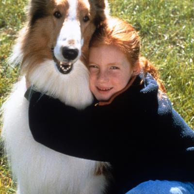 Brittany Boyd holds Lassie in a scene from the film "Lassie."