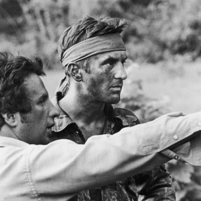 Director Michael Cimino confers with Robert De Niro on the set of "The Deer Hunter" in 1978.