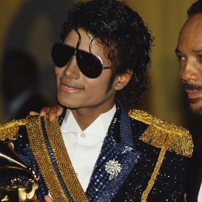 Michael Jackson and producer Quincy Jones attend the 26th Grammy Awards, where they won a record eight awards.