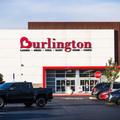 A Los Angeles Burlington retail store exterior with a parking lot in the foreground under clear skies.