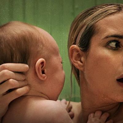 Emma Roberts with a baby in the 2022 film 'Abandoned.'