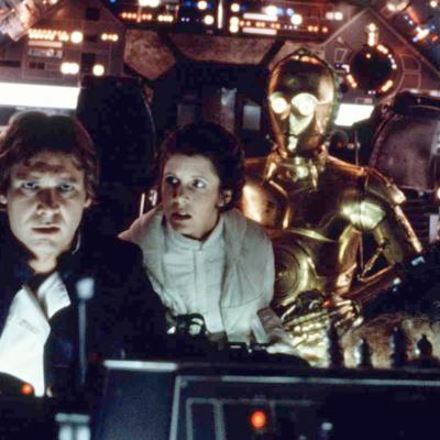 American actors Harrison Ford, Carrie Fisher, British actors Anthony Daniels and Peter Mayhew on the set of Star Wars: Episode V - The Empire Strikes Back directed by Irvin Kershner.
