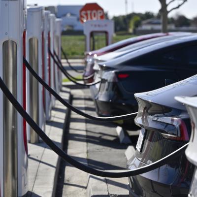 Drivers charge their Teslas in Fountain Valley, California.