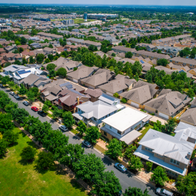 An aerial view of homes in a residential neighborhood.