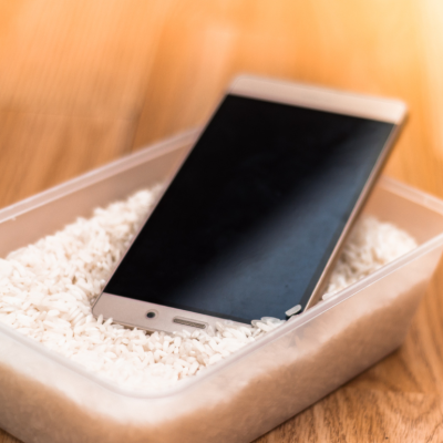 A smartphone in a bowl of rice.