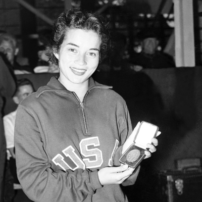 Vicky Draves shows off her gold medal at the 1948 Olympic games in London.