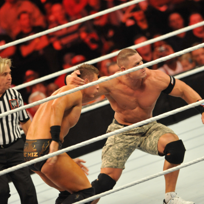 The Miz and John Cena battle during their WWE match