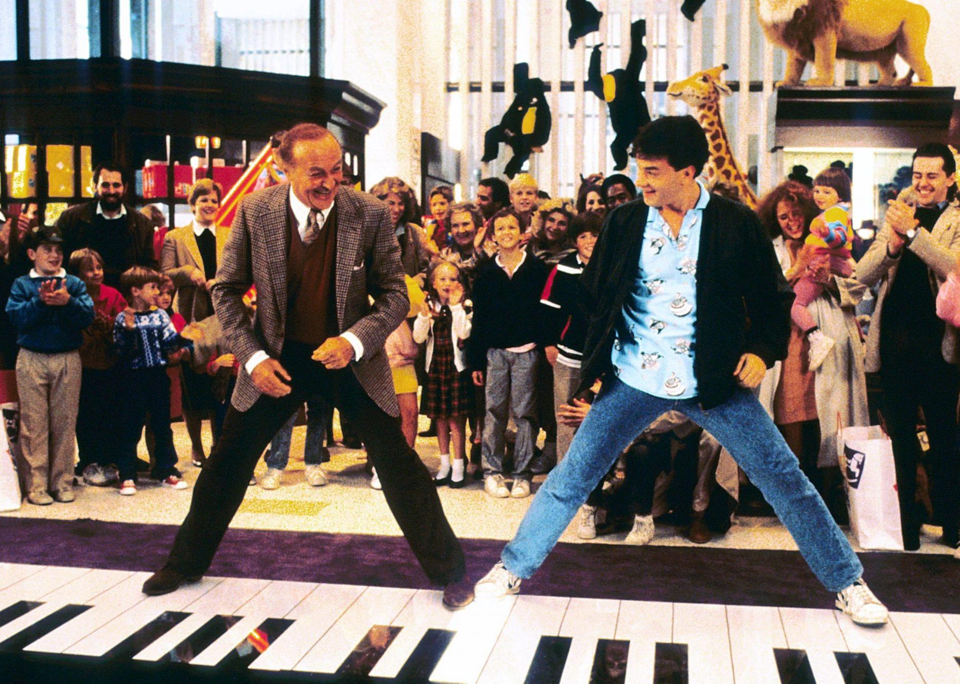 Tom Hanks dances on a giant foot piano in in a toy store in the movie "Big."