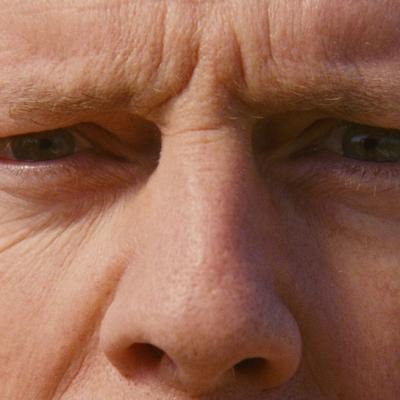 Close up of Bruce Willis's eyes.