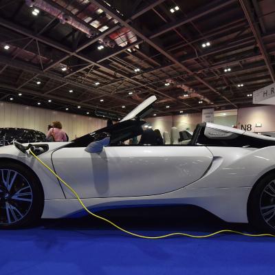 An electric BMW i8 Roadster at a motor show.